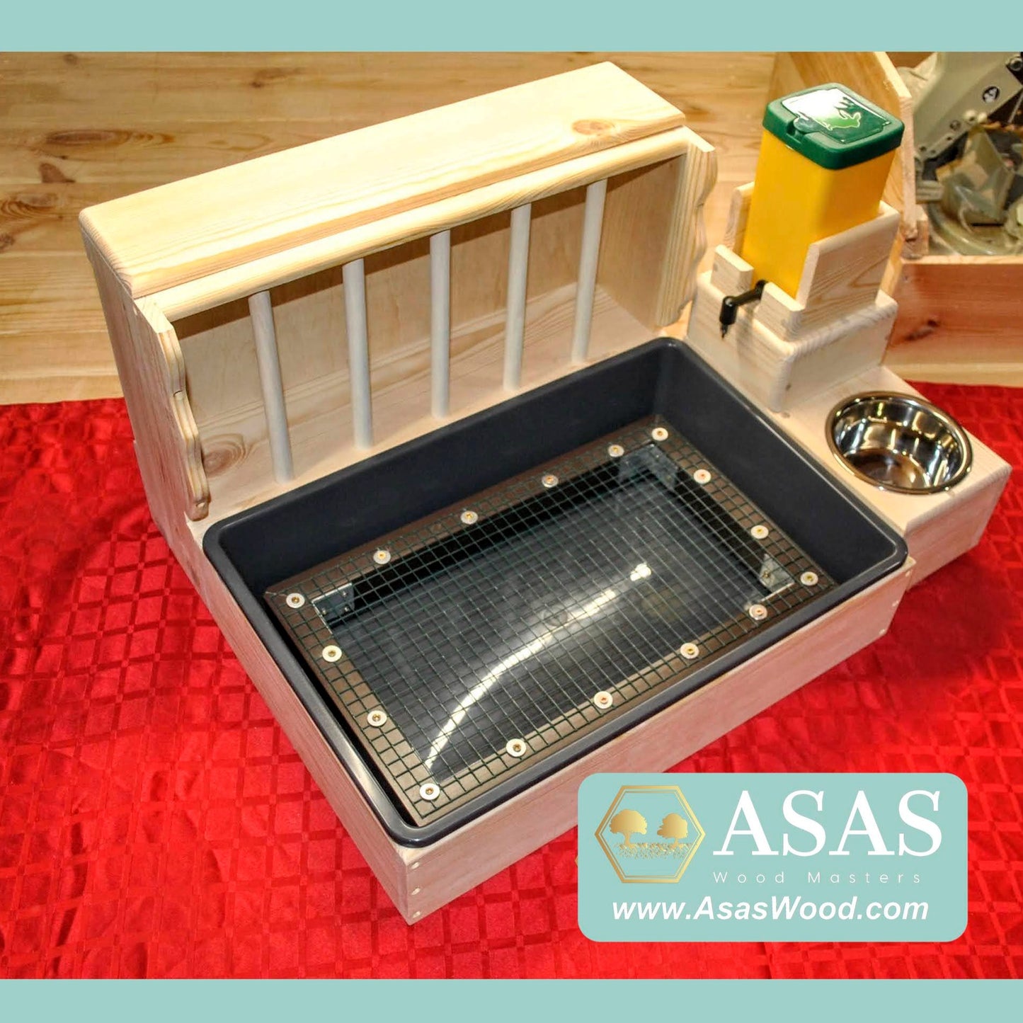 rabbit hay feeder with litter box and food bowl and nipple water bottle station, large size. Litter box has a wire mesh grate insert