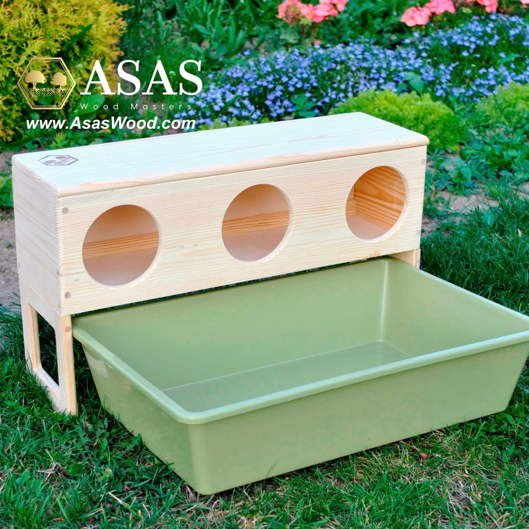 rabbit hay feeder rised over litter box surrounded by flowers, made by asaswood